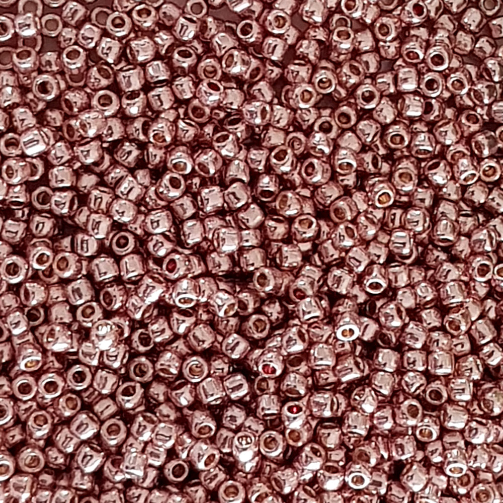 close up small rose gold beads