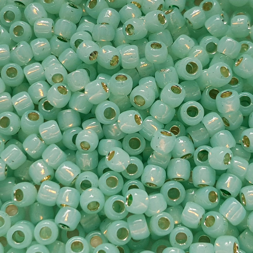 close up milky peridot beads