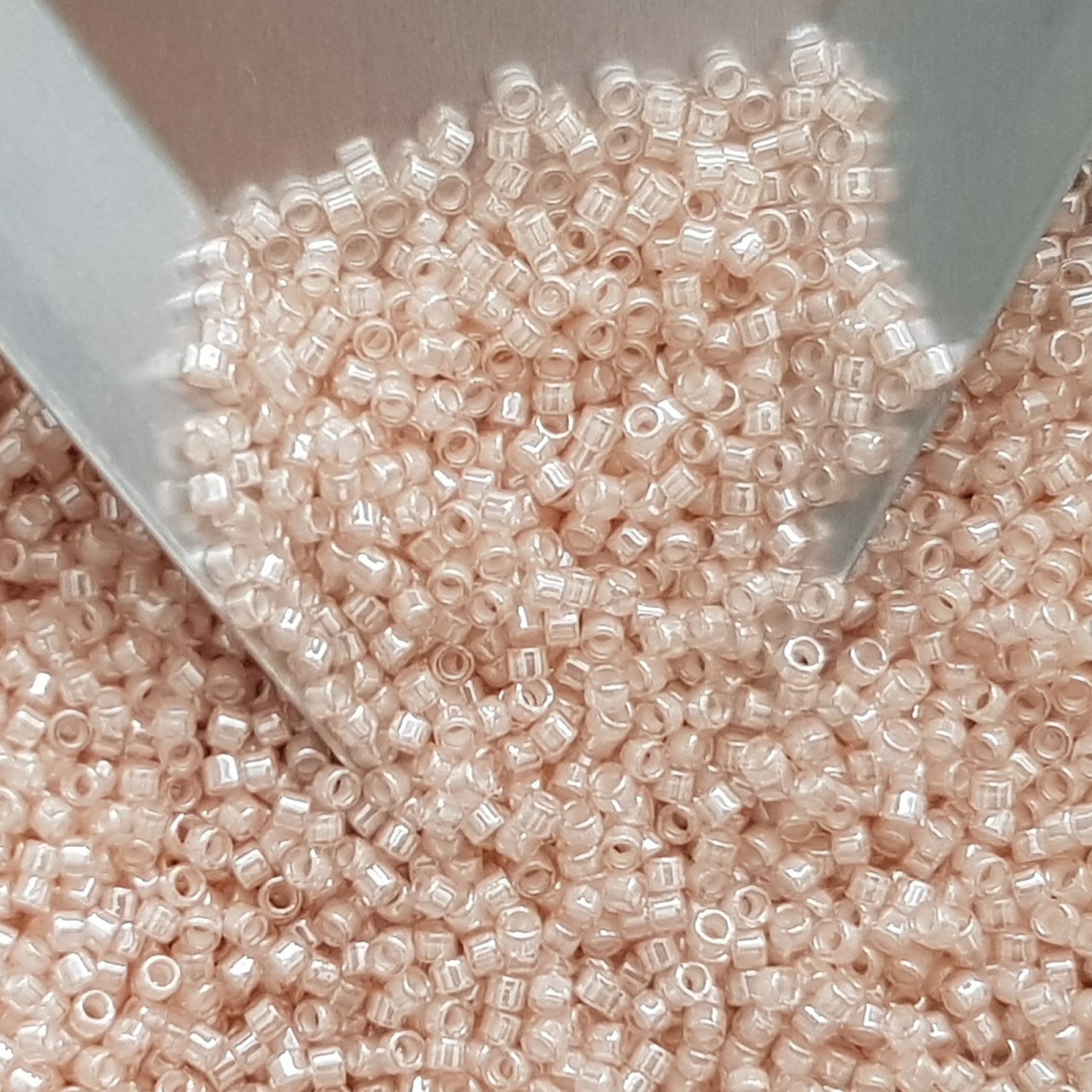 Aiko 11/0 TA-1033 Lt Rosaline White-lined 5g/10g Aiko Cylinder Toho Seed Beads | Beading Supply