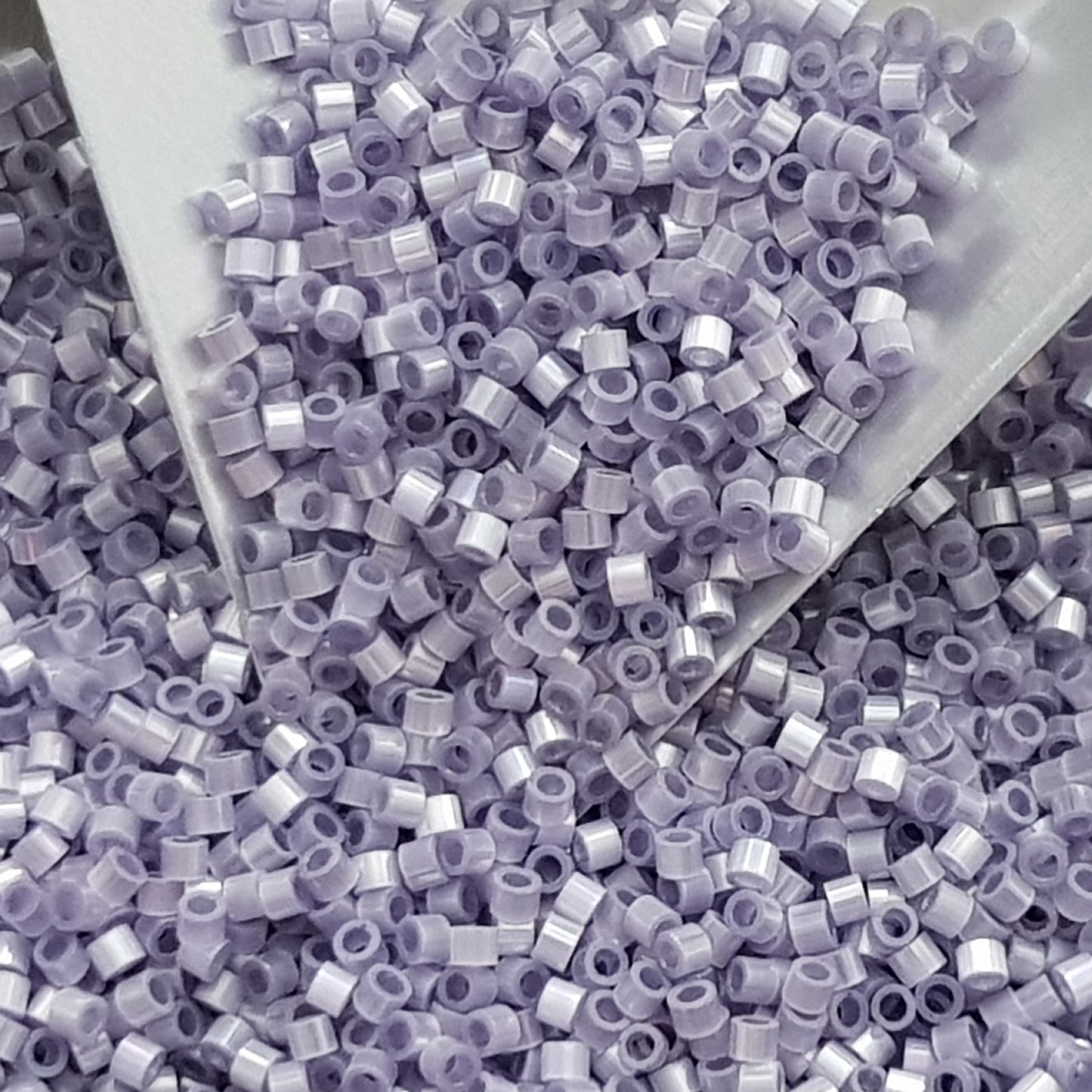 Aiko 11/0 TA-1556 Med Amethyst Rainbow Fibre-Optic Iridescent Precision-Cut Cylinder Toho Seed Beads | Beading Supply