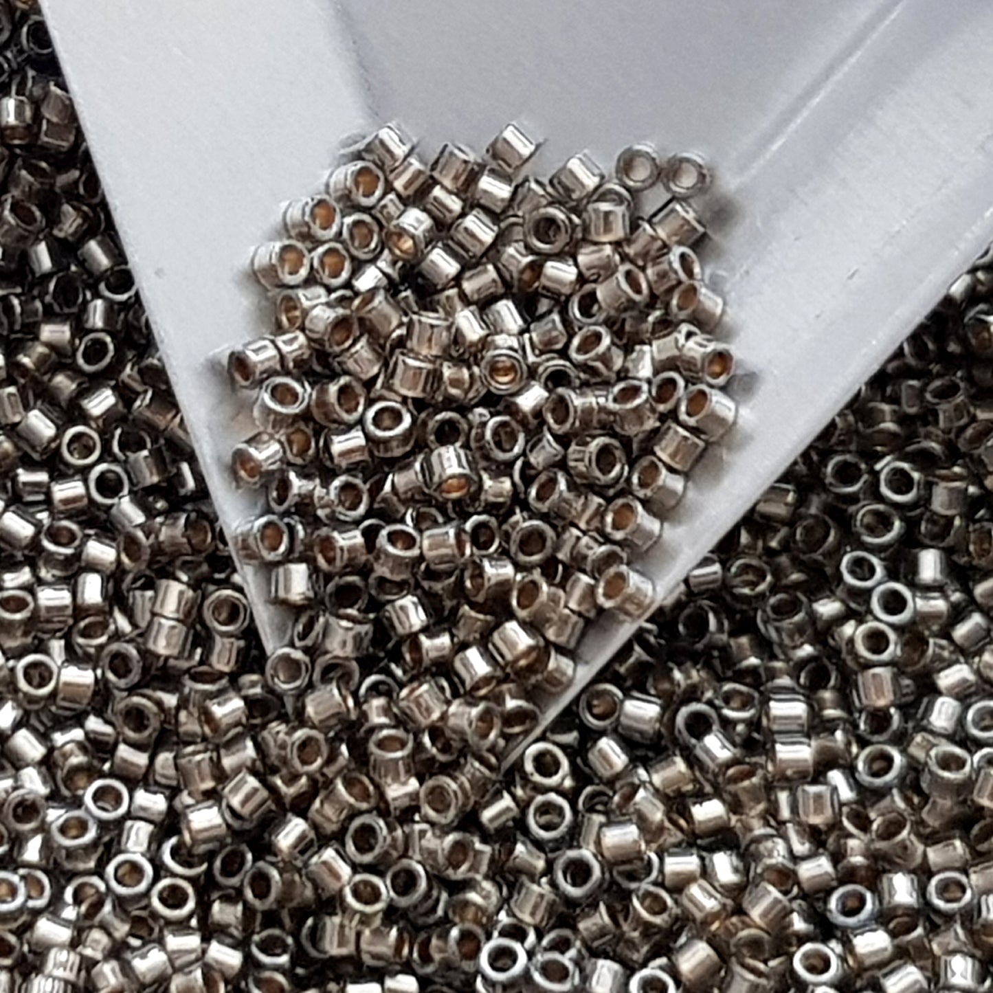 Aiko 11/0 TA-993 Black Diamond Gold-Lined Precision-Cut Cylinder Toho Seed Beads | Beading Supply
