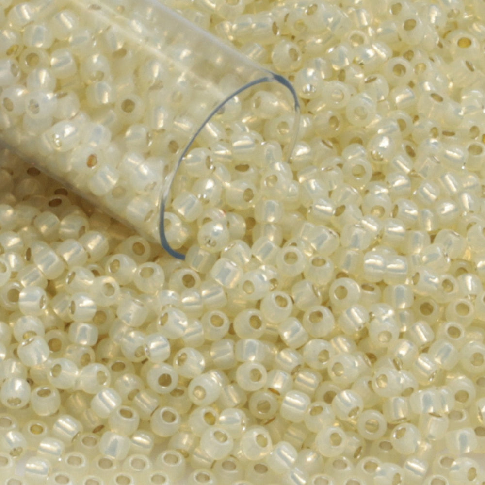 11/0 TR-2125 Milky Jonquil Ceylon Silver Lined Round Toho Seed Beads close
