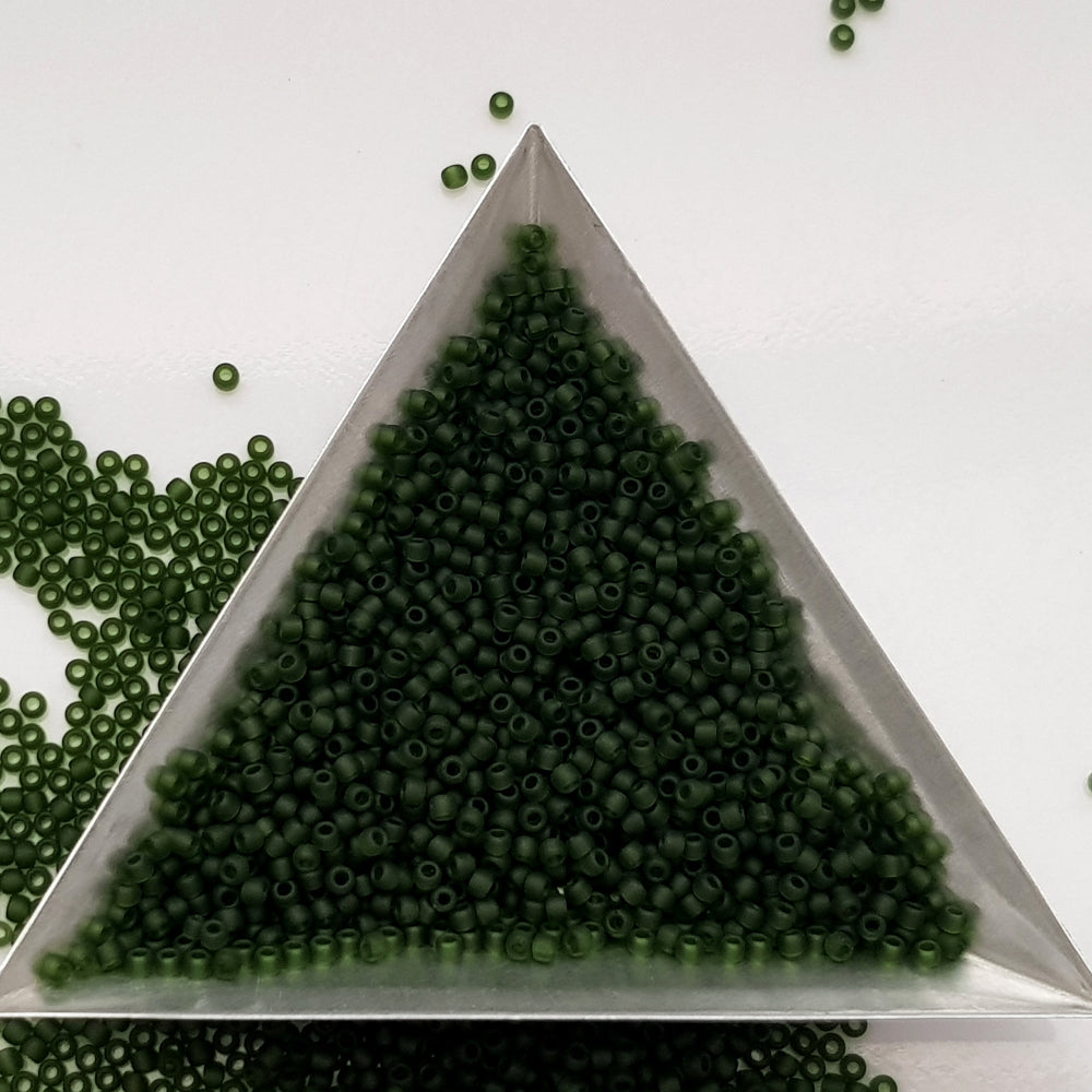 11/0 Toho Seed Beads in olivine frosted transparent TR-940F with a triangle scoop.