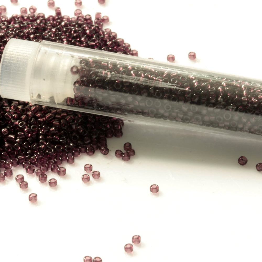 15/0 TR-6C Amethyst Round Toho Seed Beads with tube white background