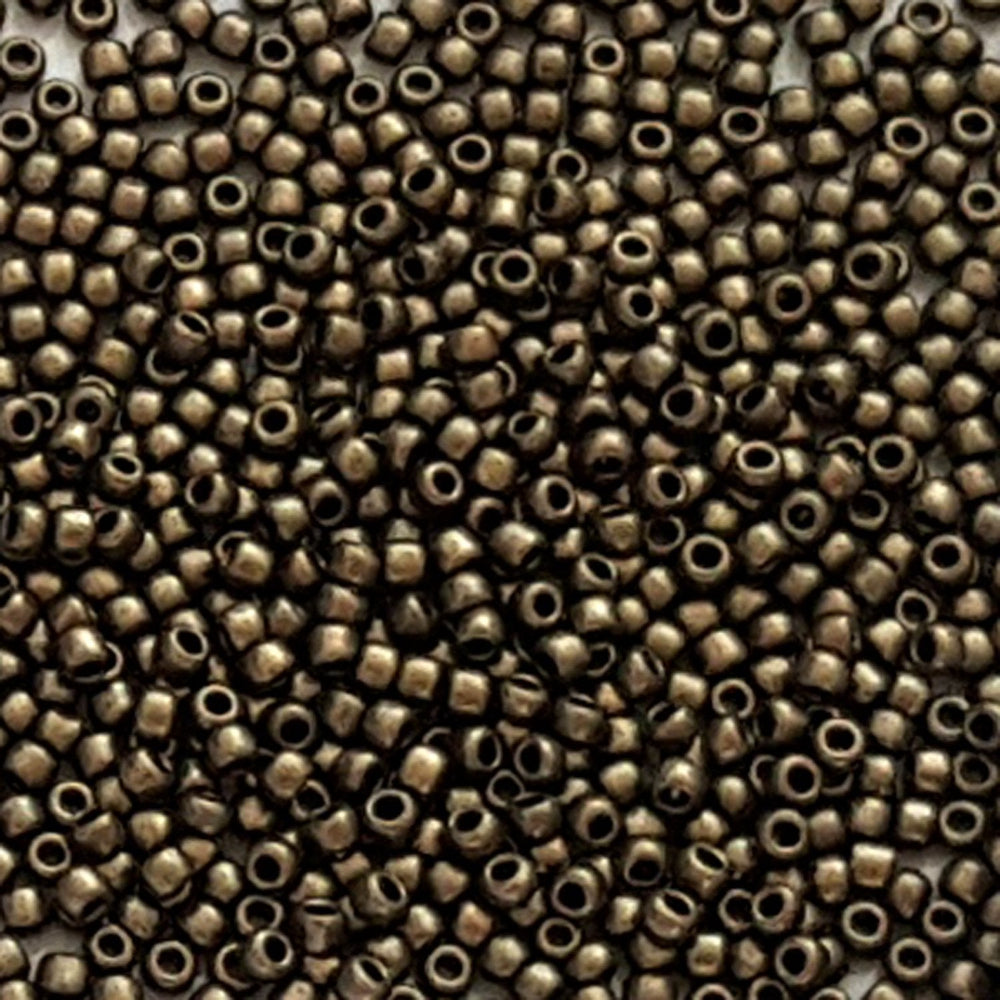 close up 6/0 TR-Y615 Gold Metallic Suede Hybrid Round Toho Seed Beads -