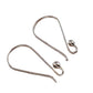 Two silver earring hooks on a white background