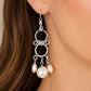 Handmade chandelier pearl earrings in Sterling Silver and Argentium with white and soft-pink freshwater pearls, worn on model