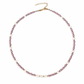 Necklace with pink and white beads on a white background