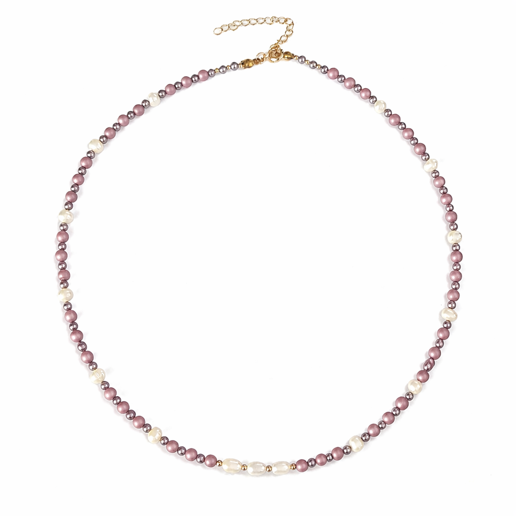 Necklace with pink and white beads on a white background