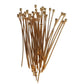 Gold headpins on a white background