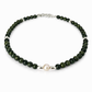 Necklace with green beads and a pearl on a white background