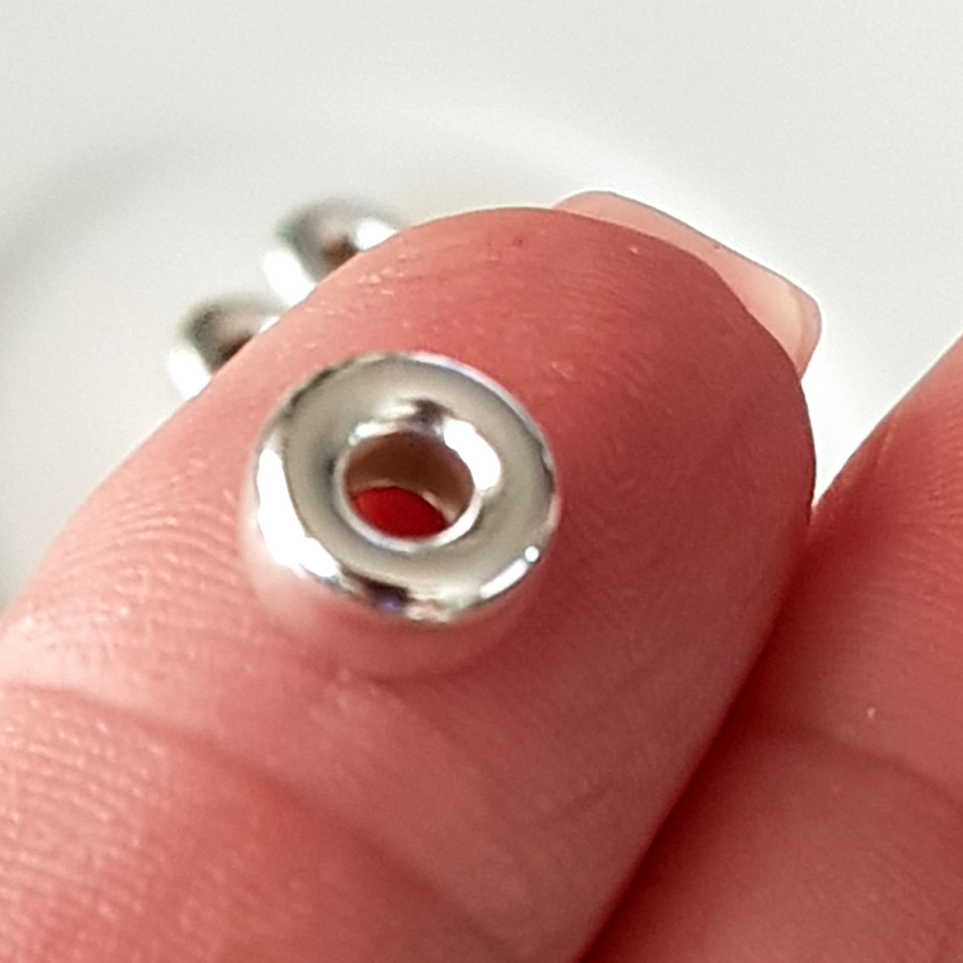 another Close-Up of Polished Sterling Silver Roundel