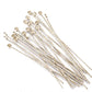 Argentium silver headpins on a white background