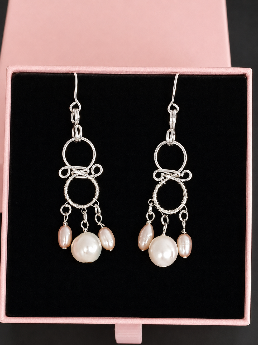 Pair of handmade chandelier pearl earrings presented in a pink gift box, sterling silver with white and soft-pink freshwater pearls – FKJ-210E by Kalitheo