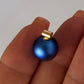 gold filled tube bail with pearl cup with a blue pearl - ideas.