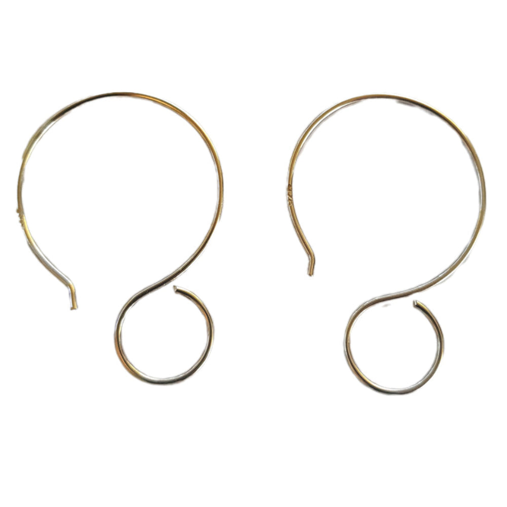 Pair of silver hoop earrings on a white background