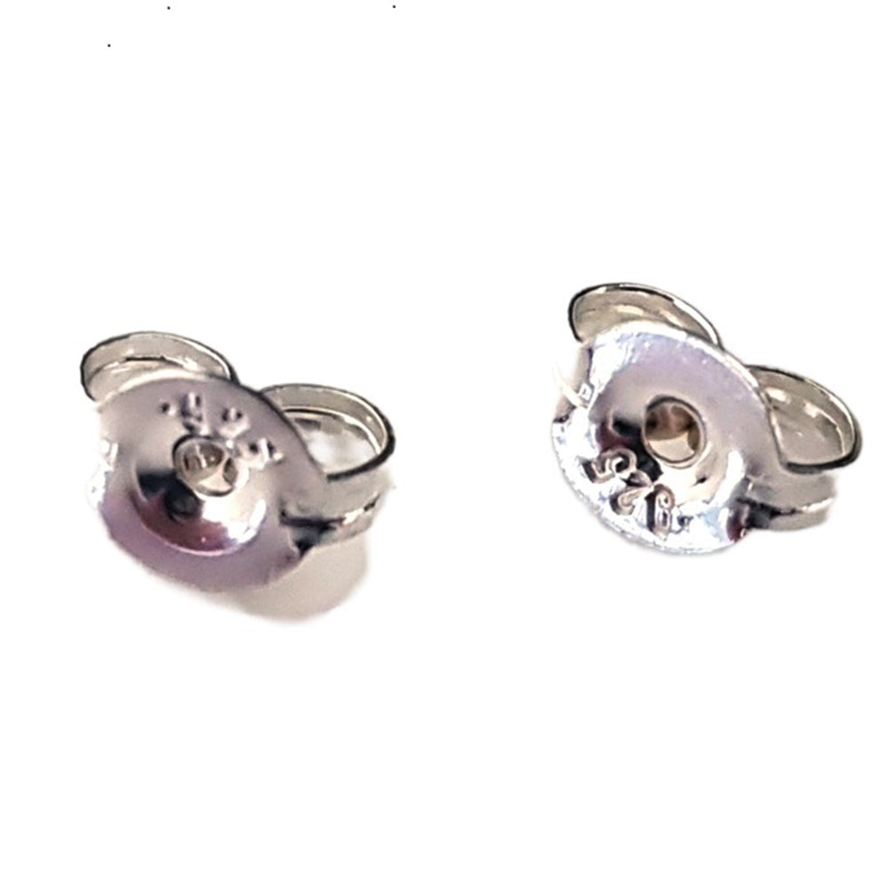 Sterling Silver 925 2 scroll earring backs, white background.