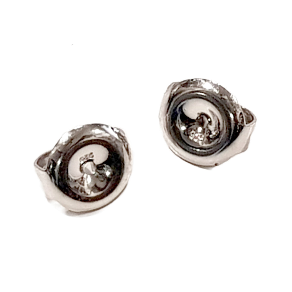 Sterling Silver Earring Backs on white background