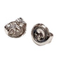 A pair of sterling silver medium weight earring backs, white background.