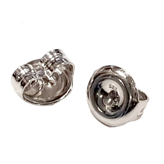 A pair of sterling silver medium weight earring backs, white background.