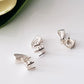 sterling silver 925 basket claw setting on a white surface