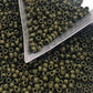 triangle scoop close up dark olive matte beads.