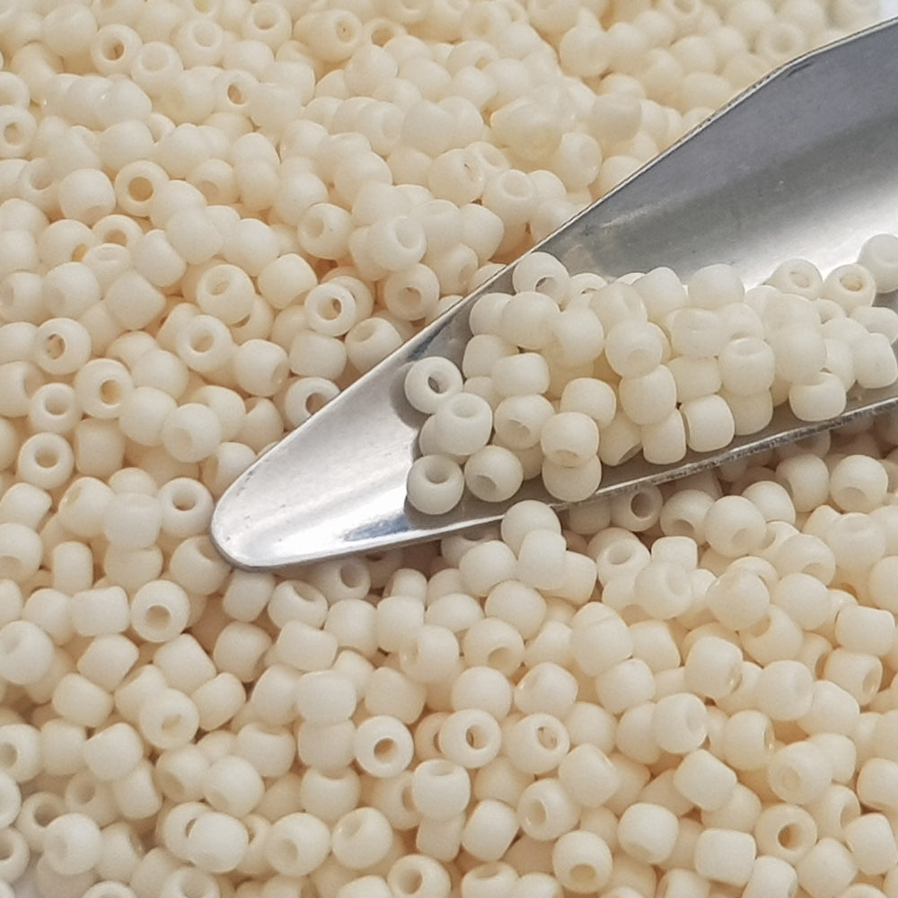 close up egg shell frosted opaque with a beading scoop.