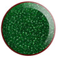 A close-up view of grass green transparent round Toho seed beads. 11/0 TR-7B white background.