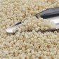 Toho 11/0 TR-51F lt Beige Frosted Opaque Beads with a beading scoop.