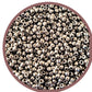 A close-up of nickel silver round Toho seed beads 11/0 TR-711