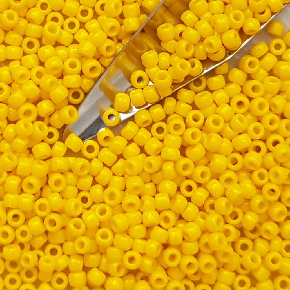 close up with beading scoop yellow beads