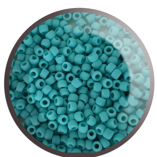 circle close up turquoise frosted beads.