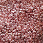 Close-up of rose gold beads