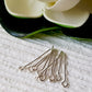 Eye Pins 20mm white background flower on top.