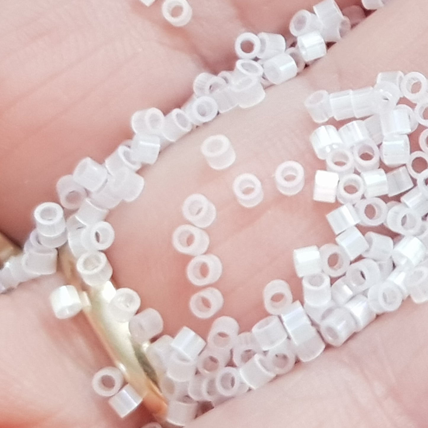 Aiko 11/0 TA-1541 Icicle Rainbow Fibre-Optic Iridescent Precision-Cut Cylinder Toho Seed Beads | Beading Supply