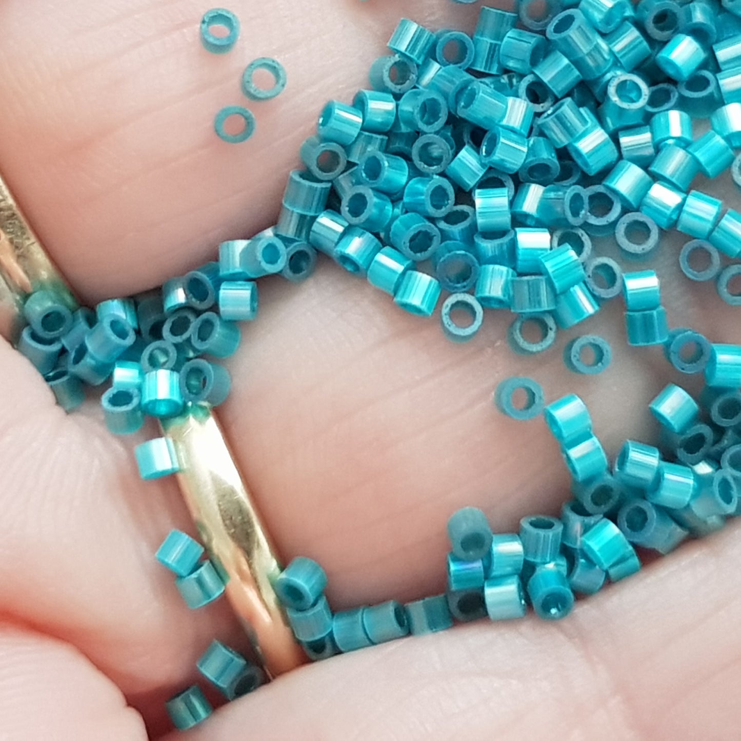 Aiko 11/0 TA-1573 Marine Blue Rainbow Fibre-Optic Iridescent Precision-Cut Cylinder Toho Seed Beads | Beading Supply