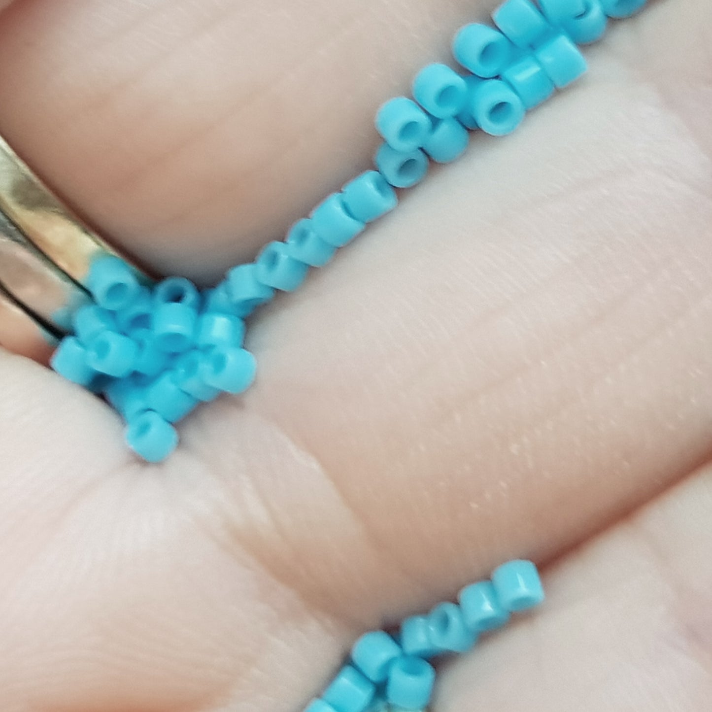 Aiko 11/0 TA-43 Kingman Turquoise Opaque Precision-Cut Cylinder Toho Seed Beads | Beading Supply