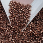 Aiko 11/0 TA-522 Rosy Brown Galvanized Precision-Cut Cylinder Toho Seed Beads | Beading Supply