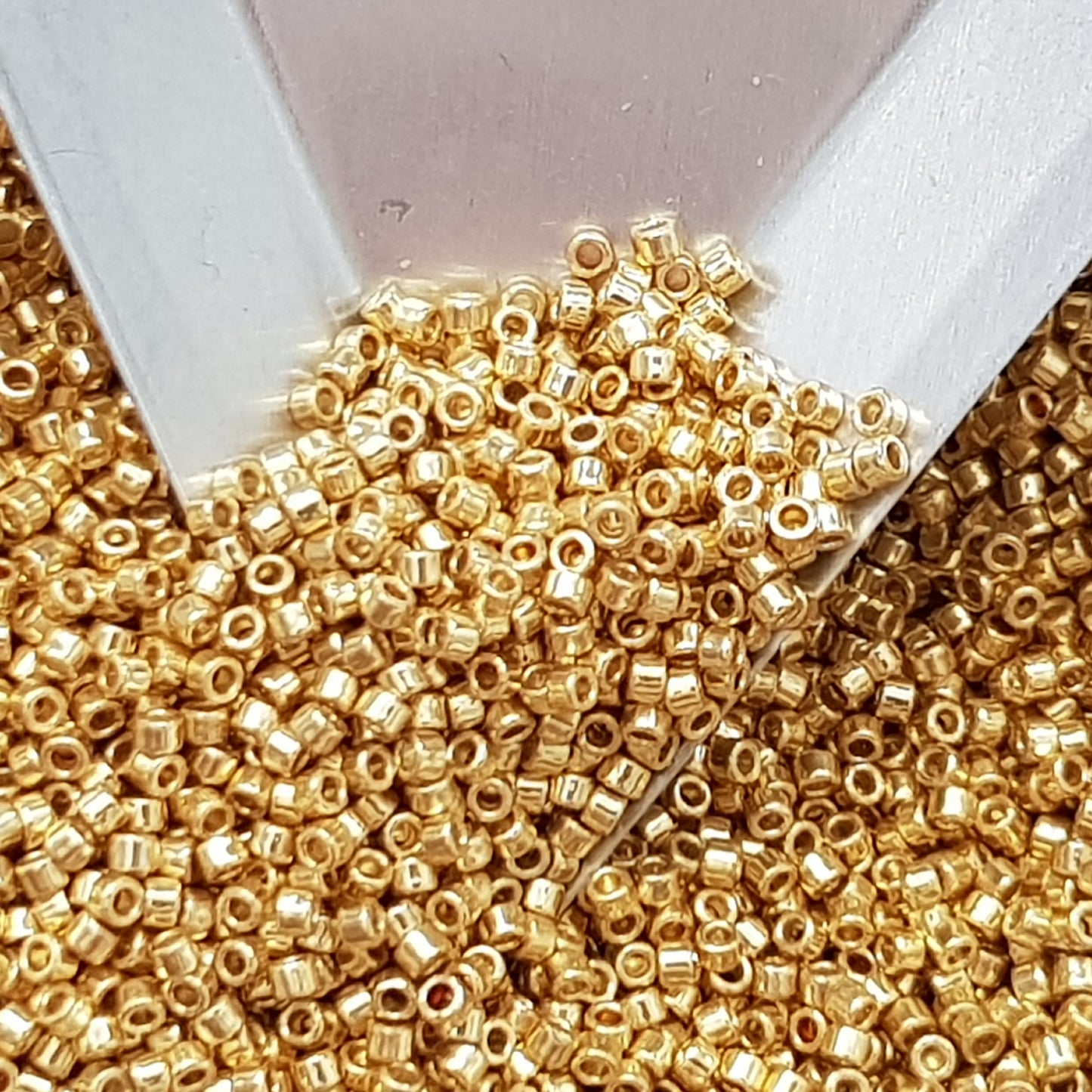 Aiko 11/0 TA-PF557 Starlight Gold Galvanized PermaFinish Precision-Cut Cylinder Toho Seed Beads | Beading Supply