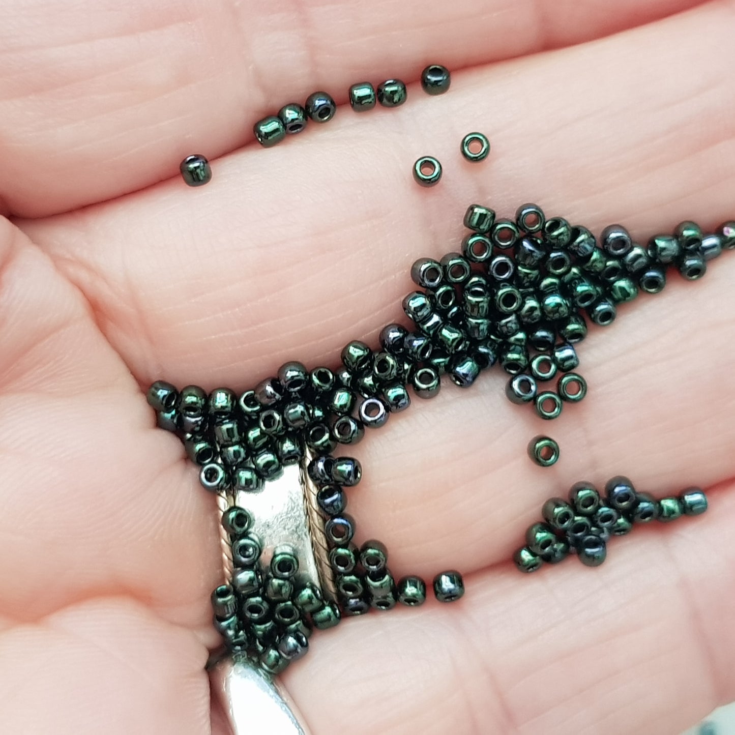 Moss Metallic #89 Toho Seed Beads Close Up on hand | Kalitheo Sydney