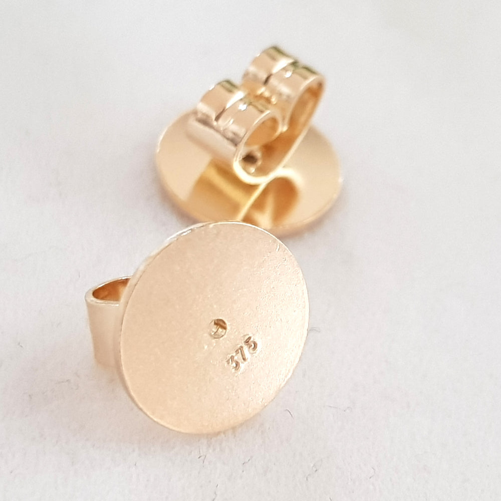 Stamped 375 Yellow Gold Earring Backs - for Studs on a white background