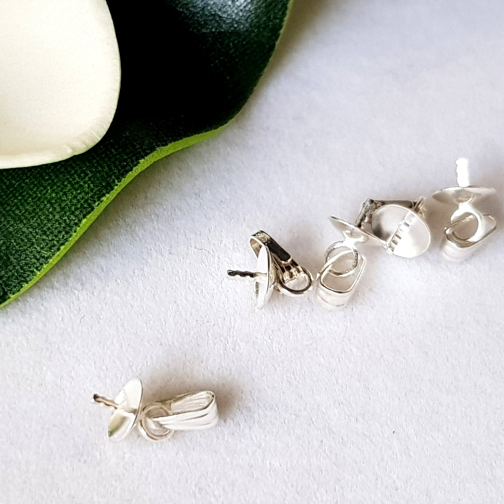 Sterling Silver 925 Pendant Drops with 5mm cups on a white surface.