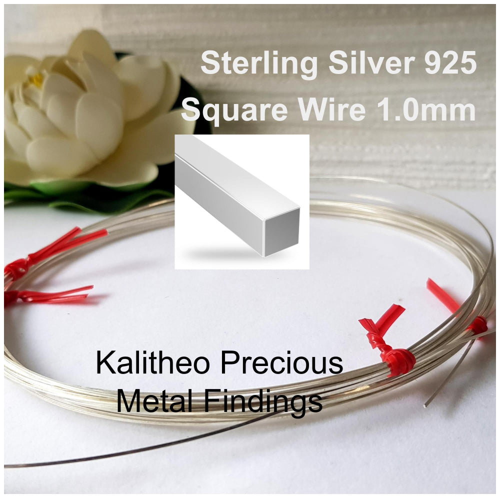 A coiled piece of sterling silver 925 square wire with red clips on the ends, labeled for jewellery making supply.