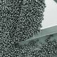 11/0 Toho seed beads in blue slate galvanized TR-PF565 with a triangle scoop.