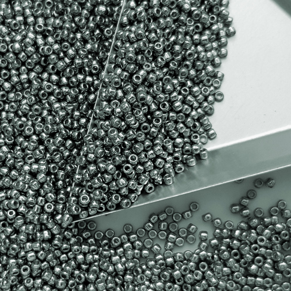 11/0 Toho seed beads in blue slate galvanized TR-PF565 with a triangle scoop.