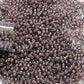 11/0 TR-367 Black Diamond Pink Lined Lustre Round Toho Seed Beads Close up.
