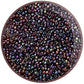 Close up in a circle 11/0 Toho Seed beads amethyst rainbow opqque.