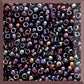 11/0 toho seed beads in amethyst rainbow opaque in a square window.