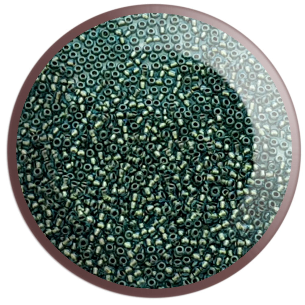 11/0 TR-284 Aqua Gold Lined Round Toho Seed Beads - Beading Supply - in a circle white background.
