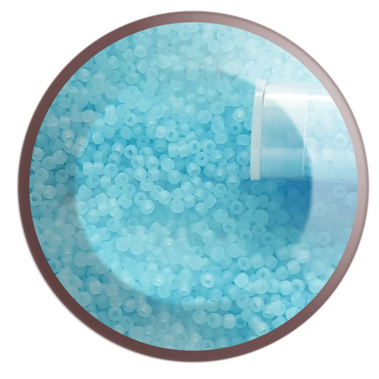 11/0 TR-143F Aqua Matte Ceylon Round Toho Seed Beads in a circle white background.
